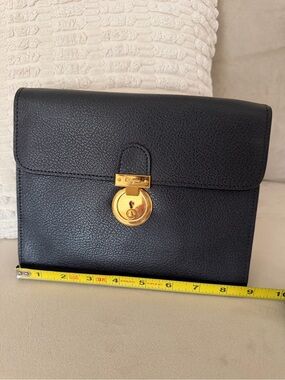 Authentic Salvatore Ferragamo Black Leather Clutch with Gold Lock GUC
